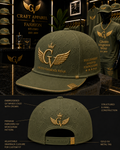 An olive green flat-brim cap with gold embroidery and a monogram pattern, shown in a retail display setting with front and back views and callout labels.