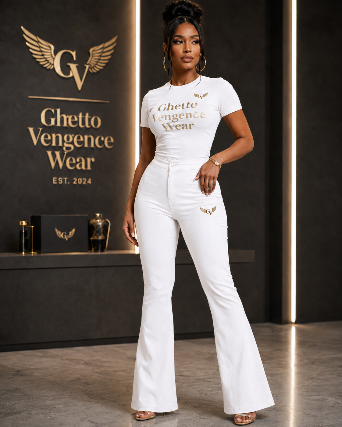 Elevated streetwear meets sophisticated style in the Ghetto Vengence Wear Signature Beige Flare Set. This coordinated women's look features a fitted short-sleeve top paired with high-waisted flare-leg pants for a sleek, flattering silhouette. Rich gold Ghetto Vengence Wear lettering across the chest and signature GV wing logo detailing give the set a polished luxury finish.

Fitted short-sleeve top with gold GV lettering
High-waisted flare-leg pants for a flattering silhouette
Signature GV wing logo detaili